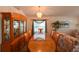 Inviting dining room with chandelier, display case, and large window providing ample natural light at 19309 Seacove Dr, Lutz, FL 33558