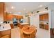 Spacious kitchen with stainless appliances, wood cabinets, tile floors, breakfast nook and built-in desk at 19309 Seacove Dr, Lutz, FL 33558