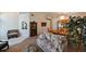 Spacious living room with a neutral color palette and lots of natural light from large windows at 19309 Seacove Dr, Lutz, FL 33558