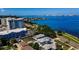 This waterfront home features a pool, separate guest house, and easy access to the city at 1951 Edgewater Dr, Clearwater, FL 33755