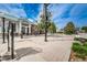 Charming exterior view of Dunedin History Museum featuring statues and vibrant landscaping at 1951 Edgewater Dr, Clearwater, FL 33755