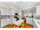 Modern kitchen with stainless steel appliances, custom cabinets, and an open layout great for entertaining at 1951 Edgewater Dr, Clearwater, FL 33755