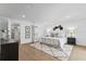 Bright main bedroom with walk-in closet, recessed lights, and a patterned rug at 1964 Tanglewood Ne Dr, St Petersburg, FL 33702