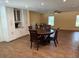 Inviting dining area featuring elegant seating, custom storage, and a warm, welcoming ambiance for gatherings at 2005 Capri Rd, Valrico, FL 33594