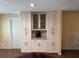 Elegant dining area with custom cabinets, offering a seamless blend of functionality and design at 2005 Capri Rd, Valrico, FL 33594