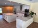 Open kitchen layout with a large island, granite countertops, stainless steel appliances, and ample cabinet space at 2005 Capri Rd, Valrico, FL 33594