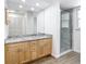 Bathroom with granite-look countertop vanity and glass shower at 20352 Astoria Ave, Port Charlotte, FL 33952