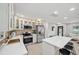 Modern kitchen with stainless appliances, ample counter space and island with barstool seating at 205 W Wheeler Rd, Seffner, FL 33584