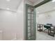 Inviting office space with green french doors, recessed lights, and vinyl flooring at 205 W Wheeler Rd, Seffner, FL 33584