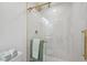 New shower is accented with gold features and has a sliding glass enclosure at 205 W Wheeler Rd, Seffner, FL 33584
