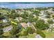 Aerial view of property highlighting its location near the water and featuring a backyard pool at 211 Arlington E Ave, Oldsmar, FL 34677