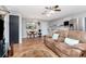Inviting living room with hardwood floors, stainless steel appliances and comfortable seating at 23924 Forest Pl, Land O Lakes, FL 34639