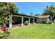 Enjoy the outdoors on this screened patio, complete with ceiling fans at 23924 Forest Pl, Land O Lakes, FL 34639