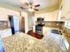 Modern kitchen with granite countertops, stainless steel appliances, and neutral-toned backsplash at 2645 Woodring Dr, Clearwater, FL 33759