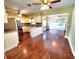 Well-designed kitchen with stainless steel appliances, mosaic backsplash, and hardwood floors at 2645 Woodring Dr, Clearwater, FL 33759