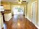 The living room features hardwood floors and sliding glass doors with backyard views at 2645 Woodring Dr, Clearwater, FL 33759