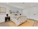 Bright bedroom with a comfortable bed, neutral décor, and ample natural light at 2837 Woodcrest Dr, Sarasota, FL 34239