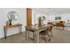 Well-lit dining room with seating for four and modern decor at 2837 Woodcrest Dr, Sarasota, FL 34239
