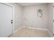 Laundry room with modern hookups, tile floor, and access to the exterior at 2905 Forest Cir, Seffner, FL 33584