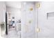 Bathroom featuring walk-in shower with marble-style tiling at 3005 1St N Ave, St Petersburg, FL 33713