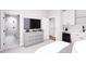 Well-appointed primary bedroom with a beverage bar and ensuite bath, offering a comfortable retreat at 3005 1St N Ave, St Petersburg, FL 33713