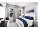 Bedroom featuring a comfortable bed with a scenic backyard at 3005 1St N Ave, St Petersburg, FL 33713