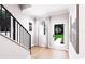 Inviting foyer with hardwood floors, bright lighting, and an exterior door for easy outdoor access at 3005 1St N Ave, St Petersburg, FL 33713