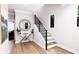 Elegant foyer with staircase, tasteful decor, and natural light creating a welcoming entrance at 3005 1St N Ave, St Petersburg, FL 33713
