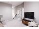 Cozy living room with soft carpet, comfortable seating, and a media center for entertainment at 3005 1St N Ave, St Petersburg, FL 33713