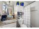 Cozy bathroom featuring modern fixtures, granite countertops, and a beautifully tiled shower at 3015 Florida Blvd, Bradenton, FL 34207