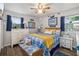 Charming bedroom with bright, beachy decor and natural light from the windows at 3015 Florida Blvd, Bradenton, FL 34207