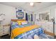 This bedroom features a cozy bed, bright decor, and natural light to create a peaceful retreat at 3015 Florida Blvd, Bradenton, FL 34207