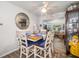 This open-concept dining room features modern furnishings and is conveniently located near the living area at 3015 Florida Blvd, Bradenton, FL 34207