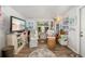This living room features tropical decor, wood flooring, and comfortable wicker chairs at 3015 Florida Blvd, Bradenton, FL 34207