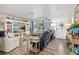 Bright living room featuring a large window, coastal-themed decor, and comfortable seating arrangement at 3015 Florida Blvd, Bradenton, FL 34207