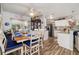 Open concept living space features a modern dining area that leads into the kitchen for seamless living at 3015 Florida Blvd, Bradenton, FL 34207