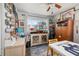 Cozy home office with a window view, decorative nautical elements, and a work table at 3015 Florida Blvd, Bradenton, FL 34207