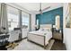 Comfortable bedroom featuring a cozy bed, stylish decor, and ample natural light at 3100 W Paul Ave # 15, Tampa, FL 33611