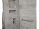 Updated shower with gray tile, built-in niche and shelving, and grab bar at 3123 29Th N Ave # 105, St Petersburg, FL 33713