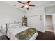 Bedroom features wood floors, ceiling fan, furniture, and a closet at 31646 Baymont Loop, Wesley Chapel, FL 33543