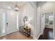 Bright foyer with tile flooring, pendant lighting and console table at 31646 Baymont Loop, Wesley Chapel, FL 33543