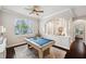 Game room with a pool table and an entryway at 31646 Baymont Loop, Wesley Chapel, FL 33543