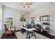 This office features neutral walls, hardwood floors, lots of light and plenty of shelf and desk space at 31646 Baymont Loop, Wesley Chapel, FL 33543