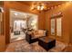 Inviting outdoor patio with comfortable seating and ceiling fan at 31646 Baymont Loop, Wesley Chapel, FL 33543