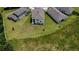 Aerial view of a beautiful backyard and surrounding homes in a well-planned residential neighborhood at 38120 Shale Stone Ct, Zephyrhills, FL 33540