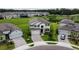 A lovely home with beautiful landscaping and a well-maintained lawn, nestled in a peaceful neighborhood at 38120 Shale Stone Ct, Zephyrhills, FL 33540