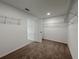 A walk-in closet provides ample storage space with wire shelving and neutral wall color, creating a functional area at 38120 Shale Stone Ct, Zephyrhills, FL 33540