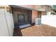 Cozy screened-in back porch featuring mulch and a new air conditioner at 4003 Oak Limb Ct, Tampa, FL 33614