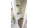 Stylish half-bathroom featuring hexagon tile flooring and a vanity with marble countertop at 4003 Oak Limb Ct, Tampa, FL 33614