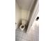 Bathroom featuring a toilet and tiled flooring at 4003 Oak Limb Ct, Tampa, FL 33614